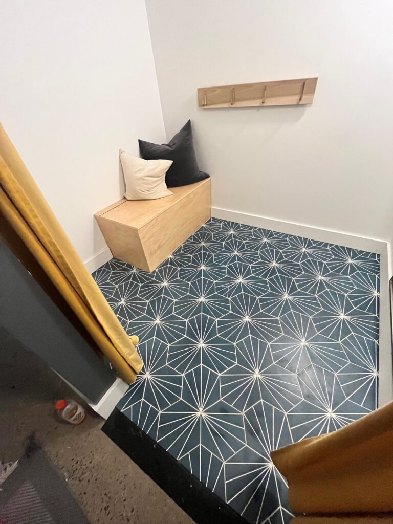Interior closet with new flooring and drywall.
