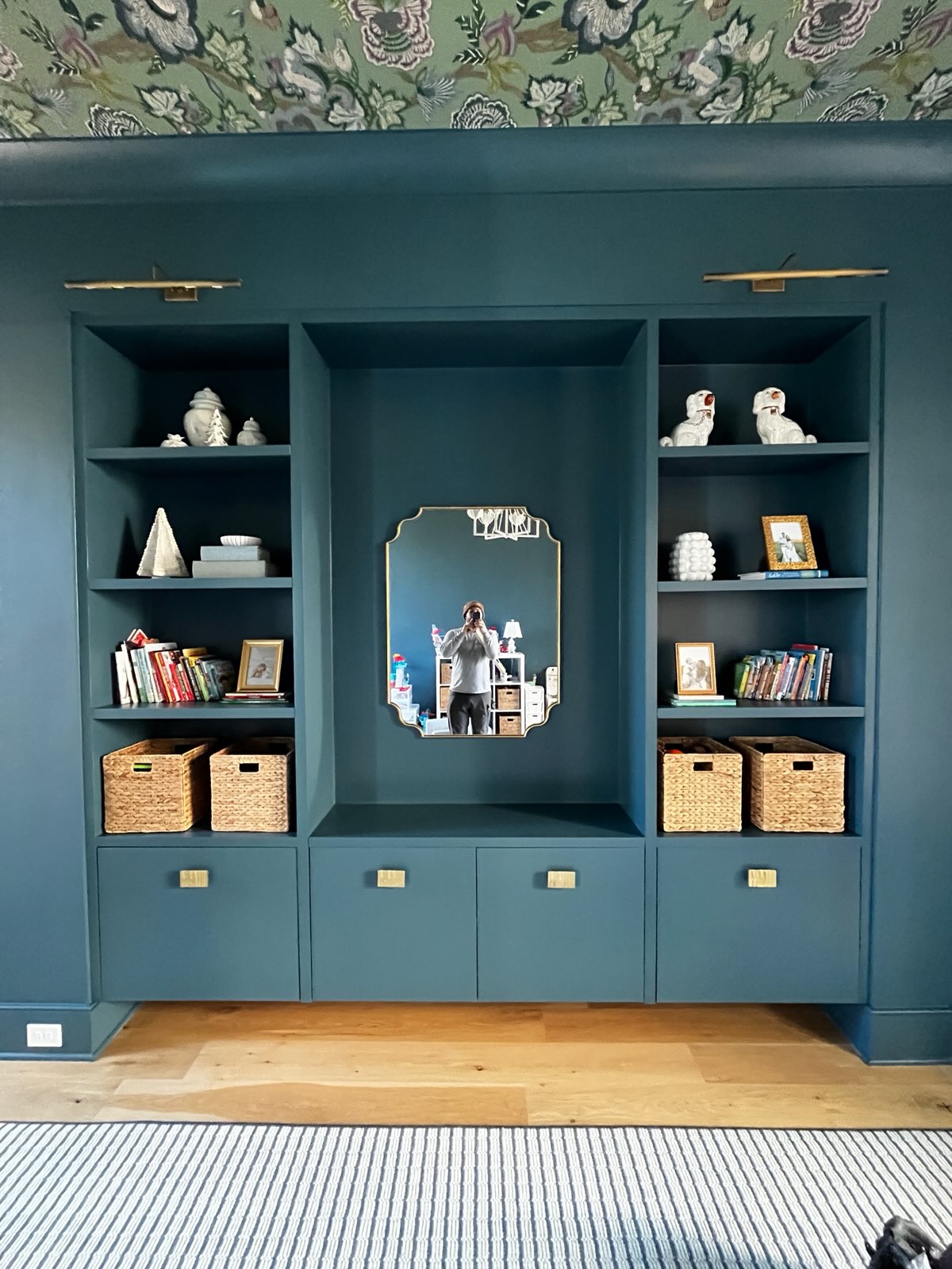 Newly put together bookshelf stained blue.